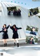 A group of young women in school uniforms dancing in front of a building.